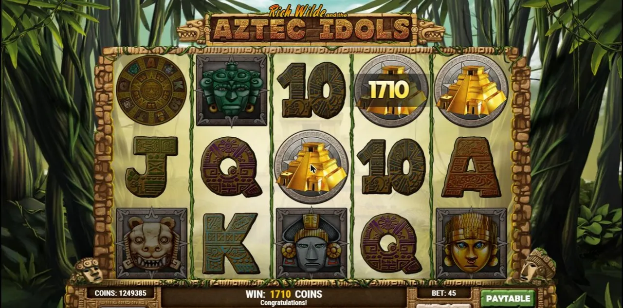 Aztec Idols base spin 79 at a $0.90 bet after the bonus: three pyramids with 1710 on one, a sunstone on reel 1, WIN 1710 COINS, BET 45