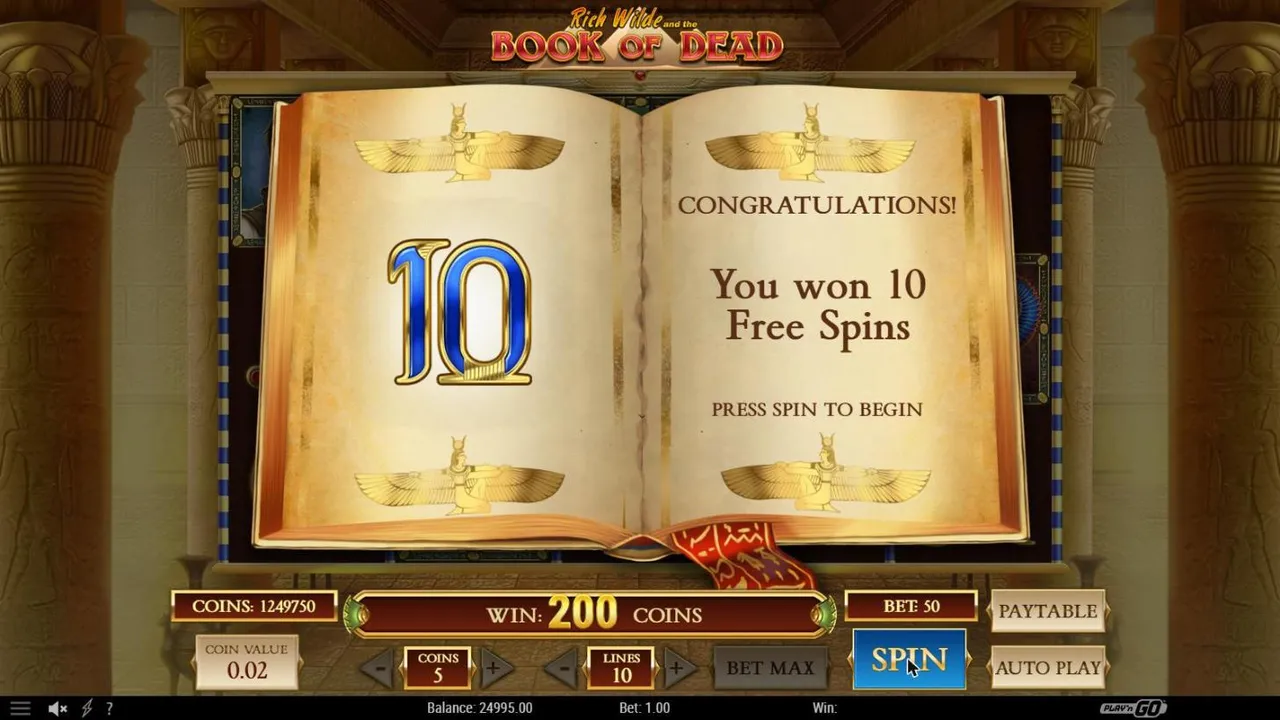 Book of Dead free spins award after base spin 6 at a $1 bet: the book open on a blue 10, You won 10 Free Spins, WIN 200 COINS