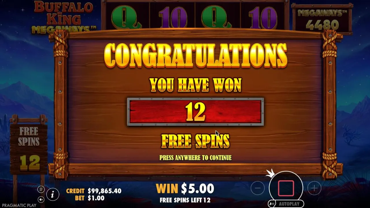 Buffalo King Megaways award screen at night after our $100 buy: YOU HAVE WON 12 FREE SPINS, with WIN $5.00 from four BONUS coins
