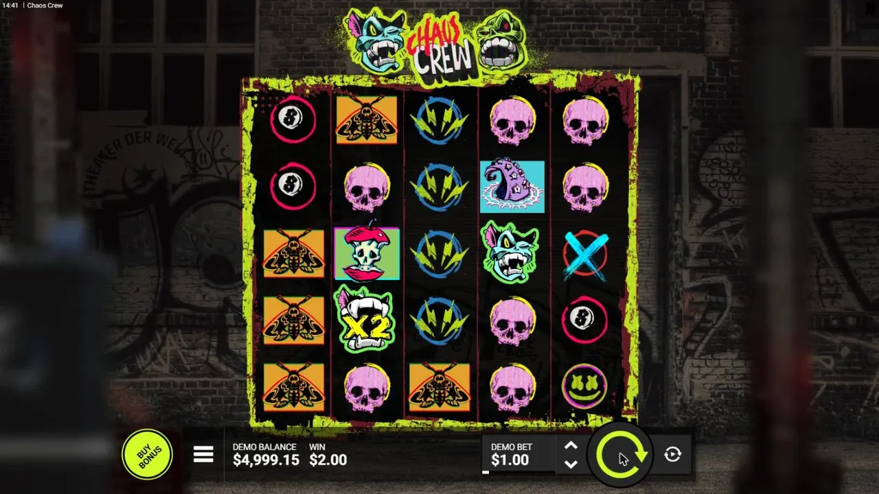 Chaos Crew base game at a $1 bet: a 5x5 grid of 8-balls, pink skulls, moths and a tentacle in a slime-green frame, an x2 Cranky Cat on reel 2