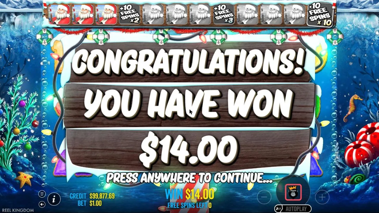 Christmas Big Bass Bonanza result screen after our $100 buy at a $1 bet: YOU HAVE WON $14.00, three Santas lit on the bar above