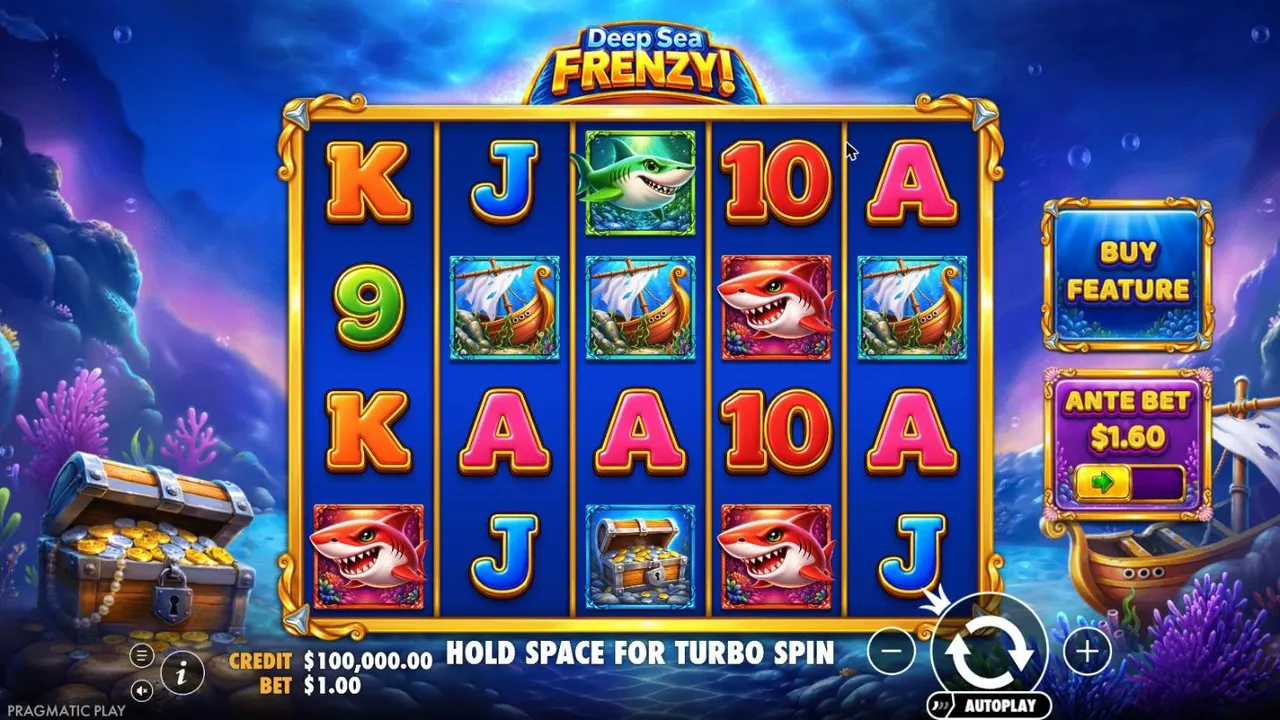 Deep Sea Frenzy base game at a $1 bet: 5x4 reels of cartoon sharks, a shipwreck, a treasure chest and card ranks on a coral reef