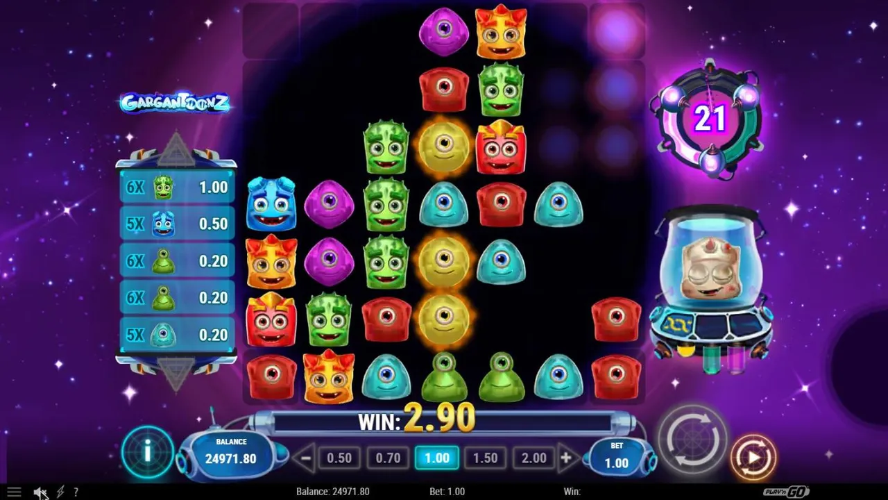 Gargantoonz base spin 34 at a $1 bet, mid-round: the 7x7 grid with gaps, the Experiment Charger at 21 and the Gargantoon in its tank