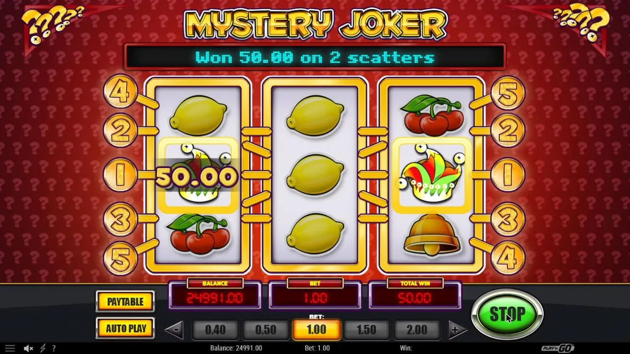 Mystery Joker free spin 3 at a $1 bet on the red background: two joker hats on reels 1 and 3, a 50.00 label and TOTAL WIN 50.00